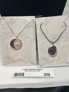 lot 39 image: Lot of 2 Silver Necklaces with Unique Pendants