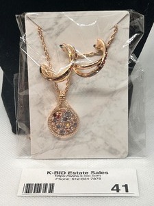 lot 41 image: Rose Gold-Tone Necklace Set with Elegant Pendant and Matching Earrings