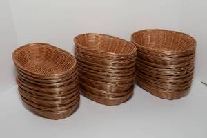 lot 24 image: Oval Wicker Style Serving Baskets - 32 Total