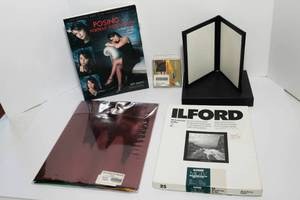 lot 32 image: Lot of Miscellaneous Photography Gear  Filters, Paper, Book & More