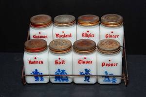 lot 68 image: Vintage Frank Tea & Spice Co. Milk Glass Spice Jar Set with Original Rack