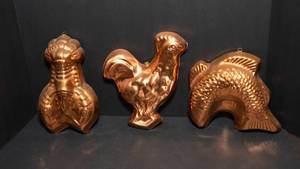 lot 87 image: Set of Three Vintage Copper-Toned Jello Molds