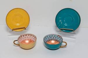 lot 96 image: Two Miniature Enamelware Cup and Saucers - Turquoise and Yellow