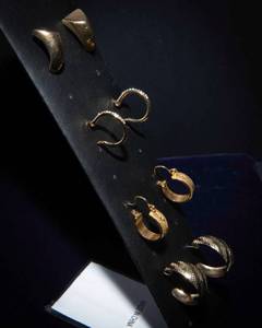 lot 27A image: Four Pairs Gold Tone Earrings  Three Hoop Styles