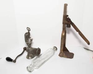 lot 189 image: Vintage Kitchen Tool Trio  Glass Role-Rite Rolling Pin, Meat Grinder & Bottle Capper