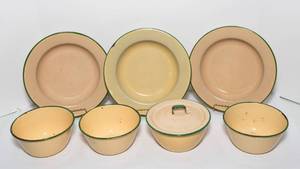 lot 198 image: Cream and Green Enamelware Plates, Bowls, and Lid