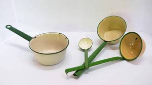 lot 239 image: Four Pieces of Cream and Green Enamelware