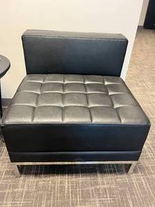 lot 21 image: Black Vinyl Armless Chair