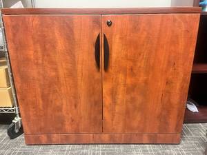 lot 49 image: Cherry two door storage cabinet