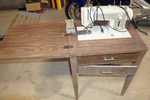 lot 824 image: Vintage Kenmore Sewing Machine in Cabinet