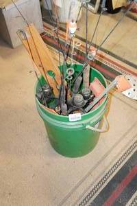 lot 399 image: Ice Fishing Poles and Tip-ups in Bucket