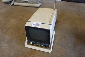 lot 327 image: Vintage Quasar Portable TVRadio