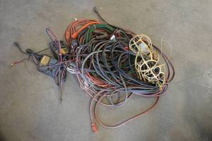 lot 499 image: Extension Cords and Power Tool Battery Chargers