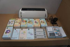 lot 5 image: Cricut with Assorted Cartridges