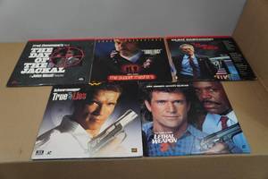 lot 104 image: 5 Laser VideoDiscs - The Day of the Jackal, Puppet Masters, True Lies