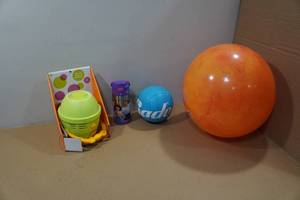 lot 121 image: Assorted Toys - Bubble Machine, Water Bottle, Volleyball, Bouncy Ball