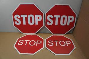 lot 219 image: 4 STOP Signs