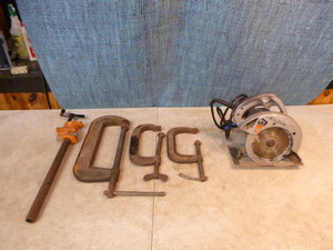 lot 13 image: Skil Circular Saw and Clamps