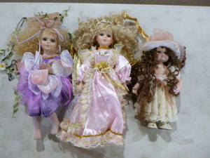lot 34 image: 3 Porcelain Dolls on Stands