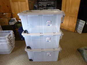 lot 61 image: 3 Sterlite Stackable Totes with Lids, Handle and on 2 Wheels