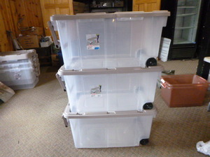 lot 62 image: 3 Sterlite Stackable Totes with Lids, Handle and on 2 Wheels