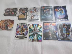 lot 64 image: JA Morant Cards...