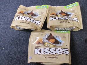 lot 229 image: 3- 10 oz Hersheys Almond Kisses...