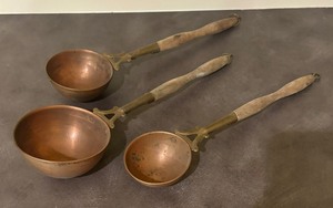 lot 101 image: Three Vintage Copper Ladles