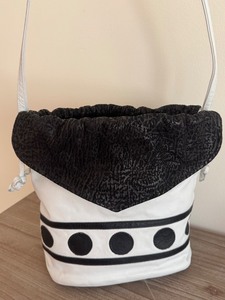 lot 76 image: Vintage White and Black Polka Dot Drawstring Shoulder Bag