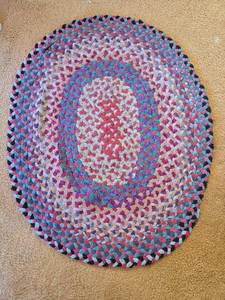 lot 20 image: Handmade Multicolor Braided Oval Rug