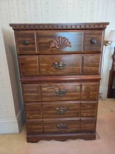 lot 33 image: Vintage Wooden 5-Drawer Chest with Carved Details
