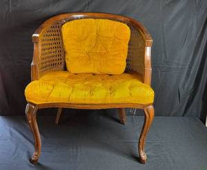 lot 37 image: Vintage Upholstered Cane Back Accent Chair