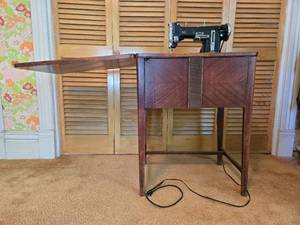 lot 63 image: Vintage Necchi-Elna Sewing Machine with Built-in Cabinet