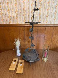 lot 76 image: Set of Decorative Candle Holder, Metal Stand, and Wooden Souvenirs
