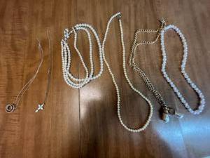 lot 96 image: Collection of Elegant Faux Pearl and Chain Necklaces with Charms Inc Sarah Coventry