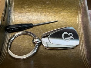 lot 109 image: Vintage Maplewood Moose Lodge Membership Box (lock is broken) with Pins and Accessories Inc Silver Tone B Key Chain