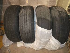 lot 215 image: Set of 4 Used Radial Tires with Maximum Load Capacity of 1499 lbs
