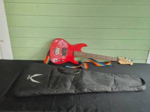 lot 218 image: J. Reynolds Electric Guitar with Rainbow Strap and Dean Gig Bag