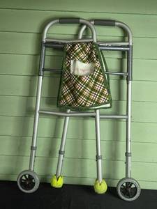 lot 221 image: Folding Walker with Attached Storage Bag and Tennis Ball Covers