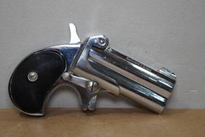 lot 33 image: Herters Nickel Plated .357 Magnum Derringer Double Barrel Pistol - 3 Barrel