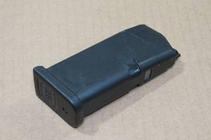 lot 86 image: Glock 9mm 10 Round Magazine