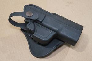 lot 137 image: Canik Molded Poly Paddle Holster