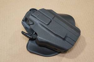 lot 139 image: Safariland Molded Paddle Holster