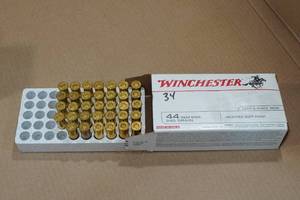 lot 152 image: 34 Winchester .44 Rem Mag 240 Gr JSP Ammo