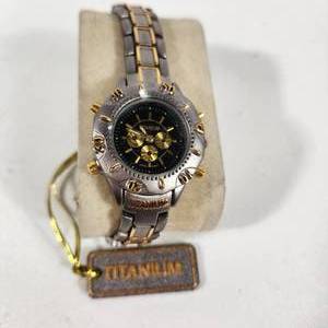 lot 3 image: Womans New Titanium SilverGold Watch Japan Movement Running