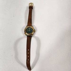 lot 6 image: Womans Gold Green Face Wrist Watch Timex Water Resistant Good Condition Running