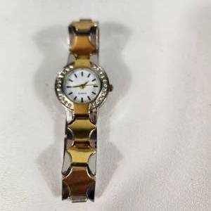 lot 12 image: Womans Quartz GoldSilver Wrist Watch China Movement Stainless Steel Back Great Condition Running