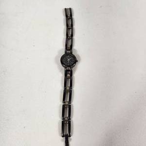 lot 13 image: Womans Quartz Rumours BlackSilver Wrist Watch 43857 Stainless Steel Back Japan Movement Fair Condition Running