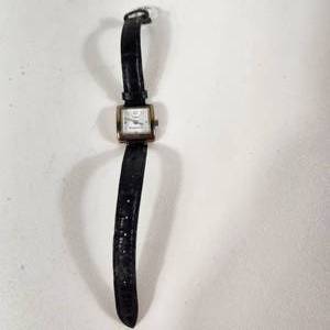 lot 20 image: Womans Timex Essentials Silver Wrist Watch With Black Leather Band Great Condition Running