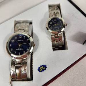 lot 60 image: WomansMens Pair Of Geneva Silver Blue Face Wrist Watches New Open Box Some Wear On Bands Great Condition